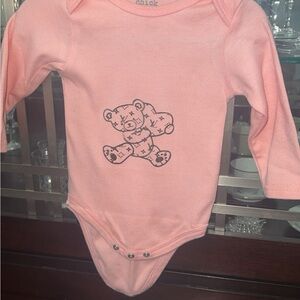 Chic Pink Bodysuit with Cloud Design